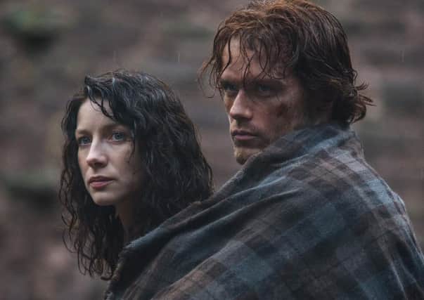 Claire Randall (Caitriona Balfe); Jamie Fraser (Sam Heughan). Picture: Outlander/Starz