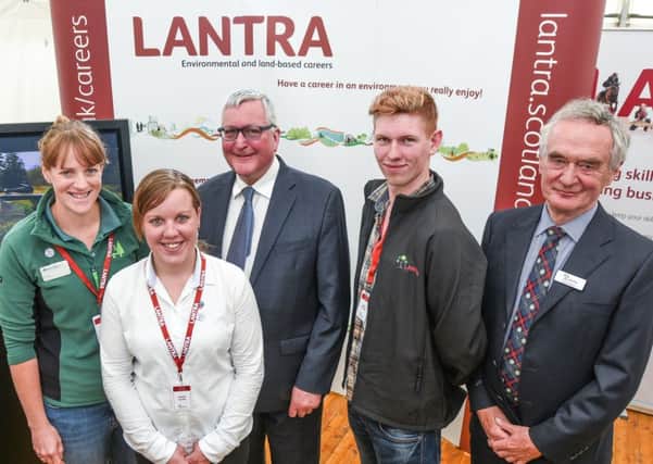 Rural economy secretary Fergus Ewing with Lantra chairman Henry Graham and some of the Lantra 'ambassadors'. Picture: Iain Forrest