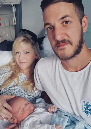 Charlie Gard and his parents Connie Yates and Chris Gard. Picture: Family handout/PA Wire