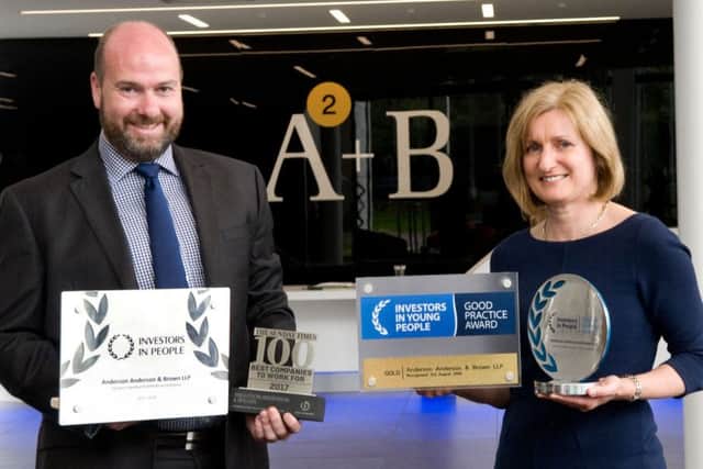 AAB's Graeme Allan and Karen Stewart with the firm's Investors in People awards. Picture: Contributed
