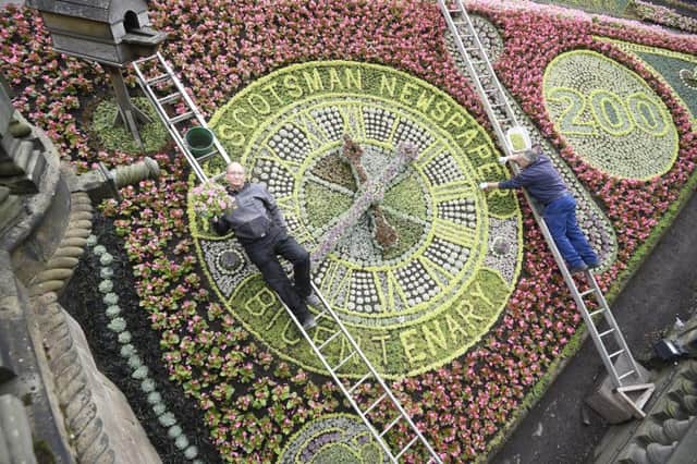The finishing touches are being applied to the floral clock in Princes Street Gardens. Picture: TSPL
