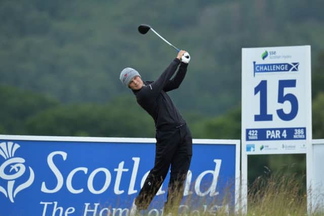 Jack McDonald plays his tee shot to the 15th hole during the second day of the 2017 SSE Scottish Hydro Challenge in Aviemore. Picture: Mark Runnacles/Getty Images