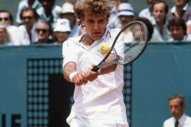 Mats Wilander hits a double backhand to Guillermo Vilas on his way to winning the French Open final in 1982. Picture: AFP/Getty Images