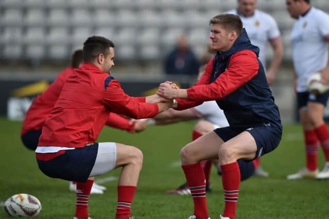 CJ Stander, left, and Owen Farrell warm up at the start of yesterdays Captains run. Picture: Getty.