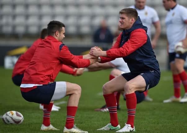 CJ Stander, left, and Owen Farrell warm up at the start of yesterdays Captains run. Picture: Getty.