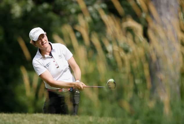 Catriona Matthew watches her tee shot at the 16th in the second round atb Olympia Fields in Illinois. Picture: Getty Images