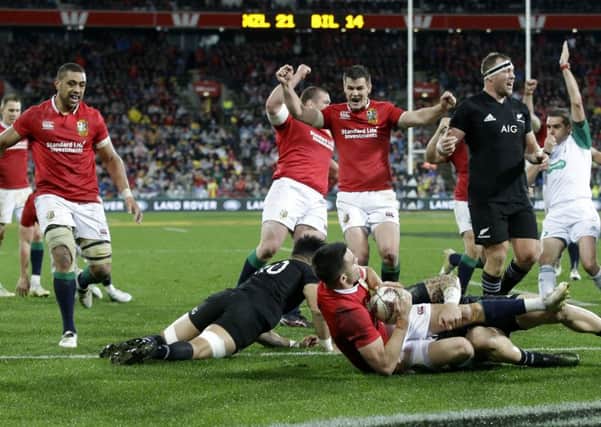 Lions players celebrate after scrum half Conor Murray scores a try during the second rugby testagainst the All Blacks in Wellington. Picture: AP Photo/Mark Baker