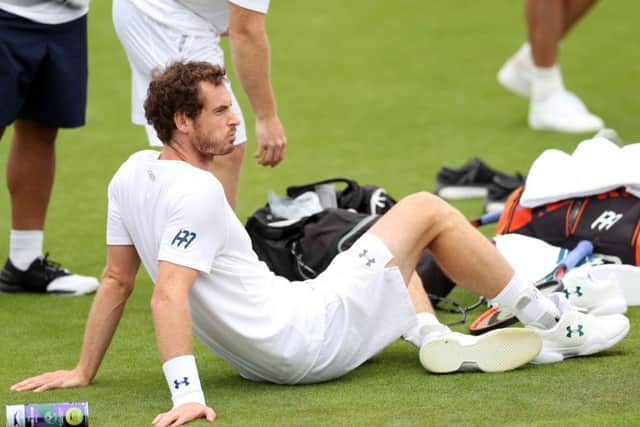 Andy Murray takes a break at the Wimbledon practice courts yesterday. Picture: Adam Davy/PA