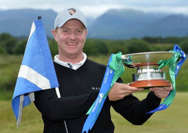 Richard McEvoy of England poses with the trophy after  winning the 2017 SSE Scottish Hydro Challenge hosted by MacDonald Hotels and Resorts at Spey Valley Golf Course. Picture: Mark Runnacles/Getty Images