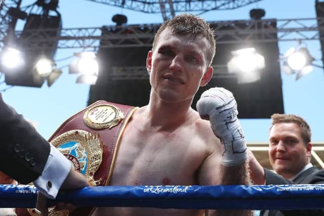 Jeff Horn shows off his WBO belt after his world welterweight title success.  Picture: Chris Hyde/Getty Images