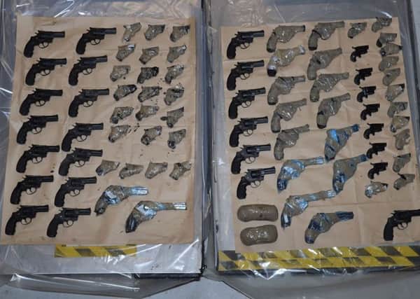 Seventy-nine "viable" weapons were recovered from the trailer of the vehicle stopped at Coquelles on Saturday by Border Force officers.Picture PA