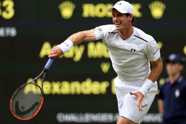 Andy Murray on his way to a three-set victory over Alexander Bublik on day one of Wimbledon.