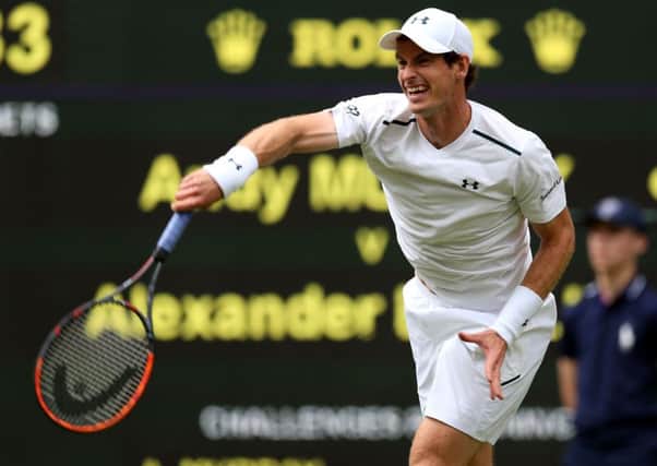 Andy Murray on his way to a three-set victory over Alexander Bublik on day one of  Wimbledon.