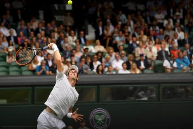 Andy Murray serves during his first round match with Alexander Bublik. Picture: Getty