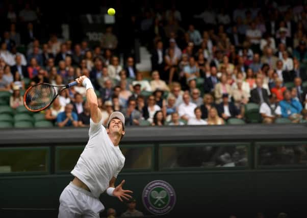 Andy Murray serves during his first round match with Alexander Bublik. Picture: Getty