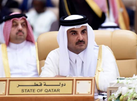 Qatar's Emir Sheikh Tamim bin Hamad al-Thani attends the 4th Summit of Arab States and South American countries in the Saudi capital Riyadh, on November 11, 2015. The summit aims to strengthen ties between the geographically distant but economically powerful regions.  AFP PHOTO / FAYEZ NURELDINE / AFP / FAYEZ NURELDINE        (Photo credit should read FAYEZ NURELDINE/AFP/Getty Images)
