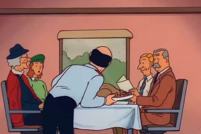 As an aside - Herge used to draw himself into many Tintin scenes. Here he is seen second right, in a train buffet car, in a scene from The Black Island. Picture: Contributed