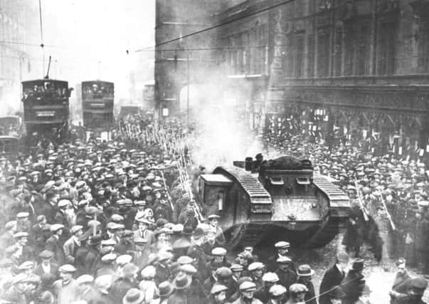 Armed troops and a tank at the Trongate in Glasgow following the George Square riot in 1919, sparked by a strike calling for a 40-hour working week. Many today would gladly welcome a 40-hour week if they could earn a living wage on it