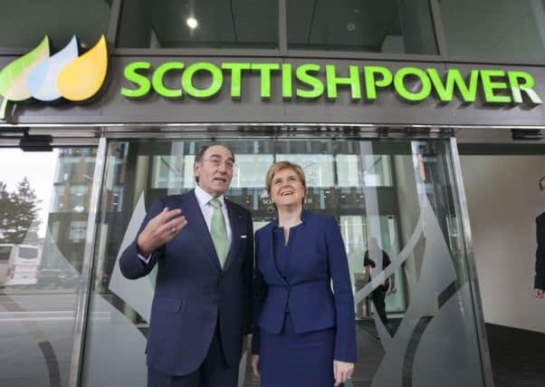 ScottishPower chairman Ignacio Galan greets Nicola Sturgeon at the official opening of the firms new Glasgow HQ. Picture: PA