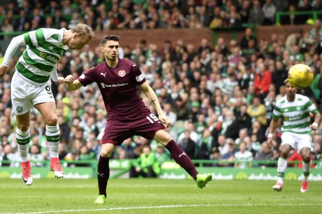 Celtic's Leigh Griffiths opens the scoring against Hearts in a 2-0 win in May. Picture: SNS