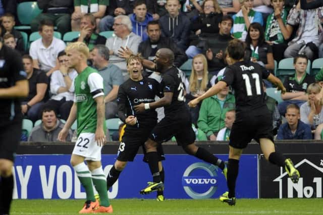 Malmo celebrate their fourth goal at Easter Road in 2013. The Swedish side defeated Hibs 9-0 on aggregate. Picture: Greg Macvean