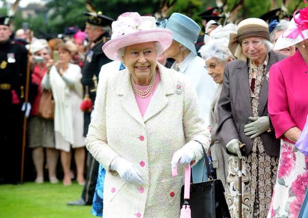 The Queen has been  busy during her stay at Holyrood this week, what with inspecting the troops, handing out honours, hosting garden parties and welcoming prime ministers and first ministers. Picture: Lisa Ferguson