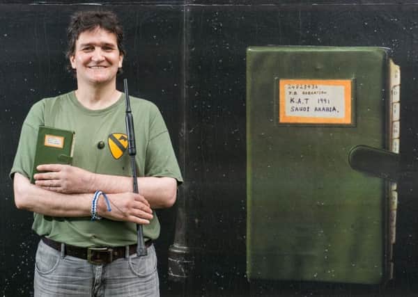 A photo taken by a homeless Scottish Gulf War veteran Jamie Robertson showing the notebook he kept during the conflict is among a series of billboard artworks marking the 50th anniversary of the charity Crisis.