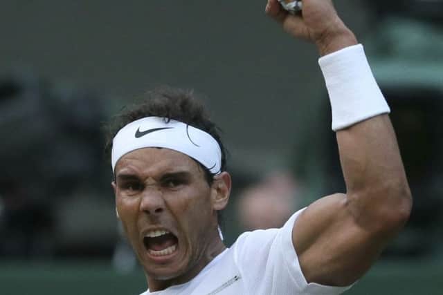 Rafael Nadal celebrates his win over Donald Young. Picture: AP Photo/Tim Ireland