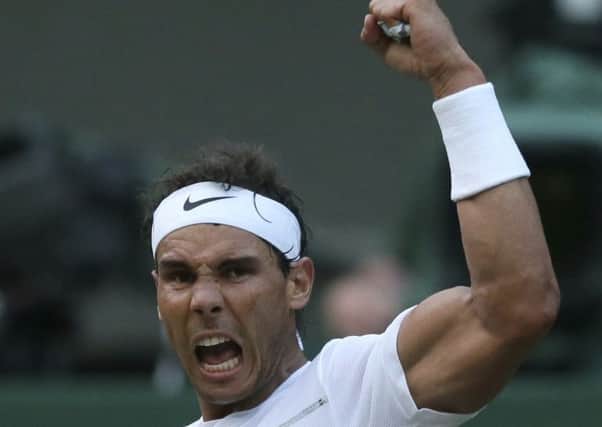Rafael Nadal celebrates his win over Donald Young. Picture: AP Photo/Tim Ireland