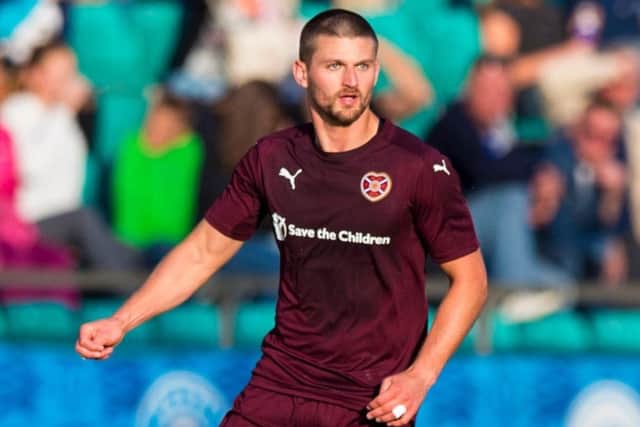 Perry Kitchen has left Hearts to join Danish side Randers.