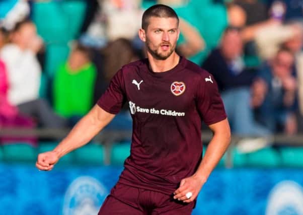 Perry Kitchen has left Hearts to join Danish side Randers.