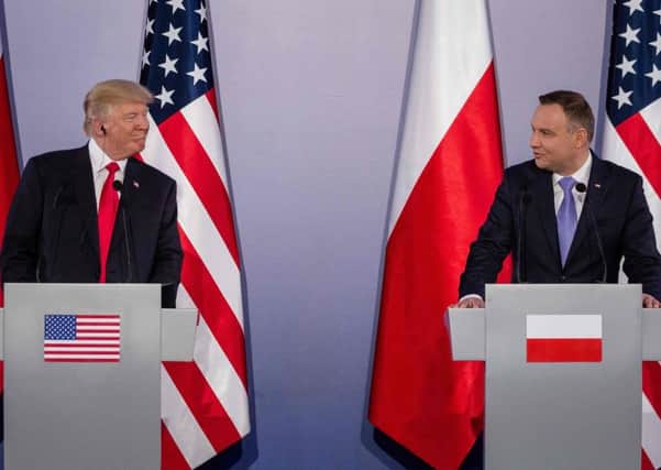 President Donald Trump and Polish President Andrzej Duda hold a joint press conference at the Royal Castle in Warsaw. Picture: AFP/Wojtek Radwanski/Getty Images