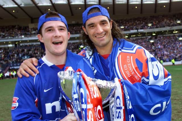 Barry Ferguson (left) and Rangers team-mate Lorenzo Amoruso after the 2002 CIS Cup final. Picture: SNS