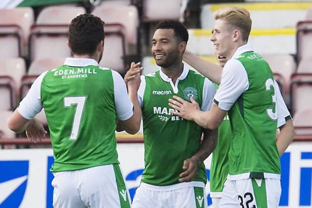 Jermaine Pennant celebrates scoring Hibs' second goal. Picture: SNS.