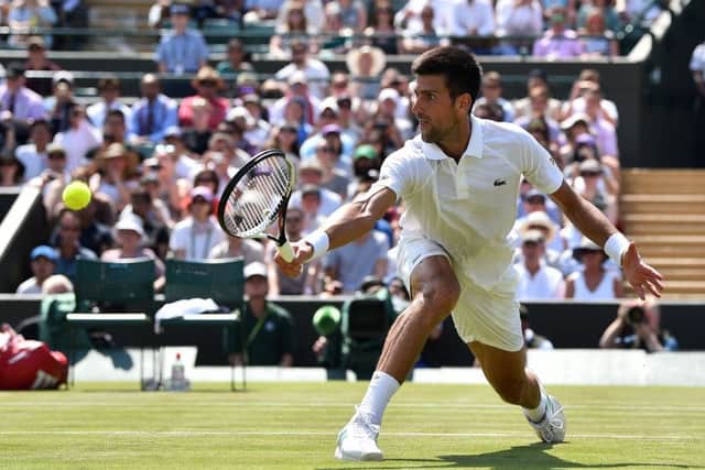 Novak Djokovic returns during his 6-2, 6-2, 6-1 win over Czech Republic's Adam Pavlasek on Court No 1. Picture: AFP/Getty Images