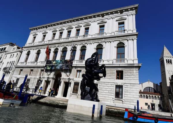 The Palazzo Grassi, where the Damien Hirst show Treasures from the Wreck of the Unbelievable is on display. Picture: Miguel Medina/AFP/Getty Images