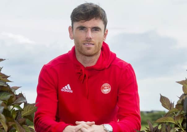 Greg Tansey, after making his debut for Aberdeen in a pre-season friendly at St Johnstone, does not want to see his new club follow the Perth team out of Europe. Photographs: SNS
