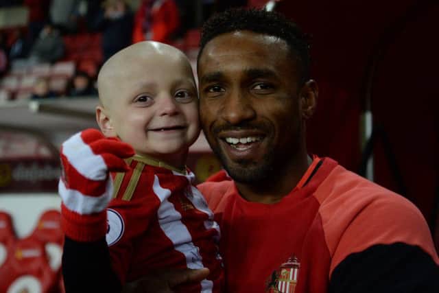 Bradley Lowery meets Sunderland's Jermain Defoe at the Stadium of Light. Picture; PA