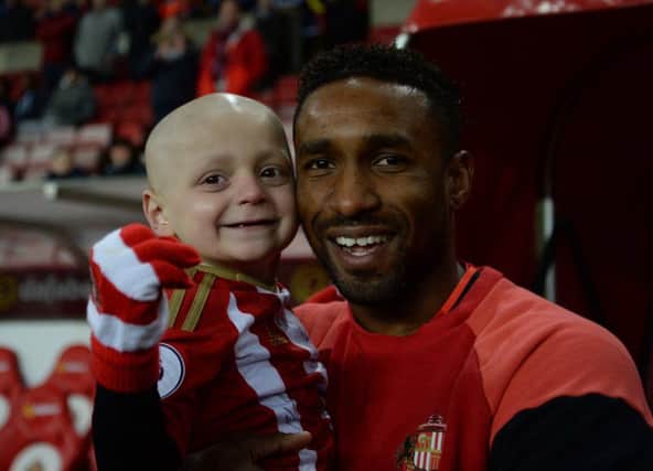 Bradley Lowery meets Sunderland's Jermain Defoe at the Stadium of Light. Picture; PA