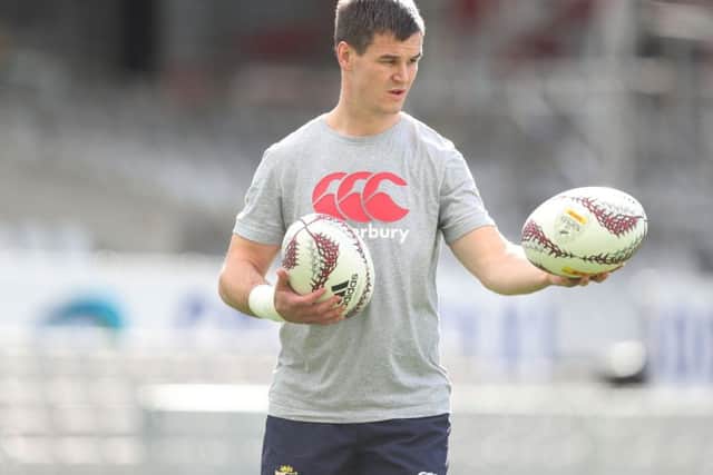 Lions No 10 Jonny Sexton keeps his eye on the ball during a kickers session. Picture: PA.