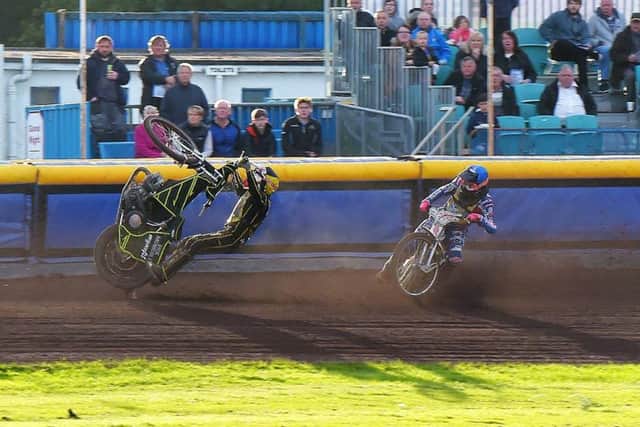 Berwick star Jye Etheridge, left, loses control of his bike as Monarchs No.4 Max Clegg races through. Picture: Ron MacNeill.