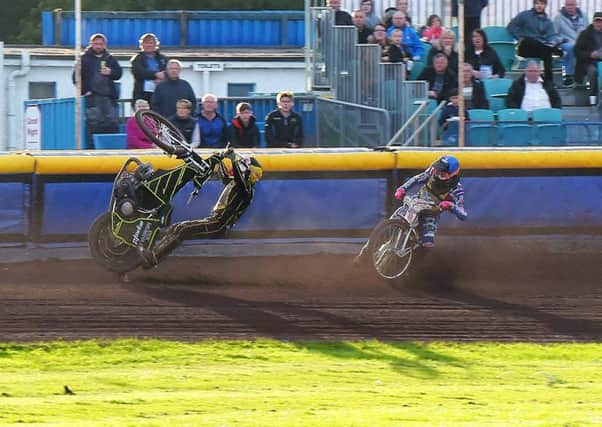 Berwick star Jye Etheridge, left, loses control of his bike as Monarchs No.4 Max Clegg races through. Picture: Ron MacNeill.