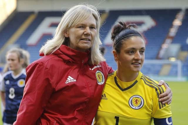 Scotland Women head coach Anna Signeul with with goalkeeper Gemma Fay after the final whistle. Picture: PA.