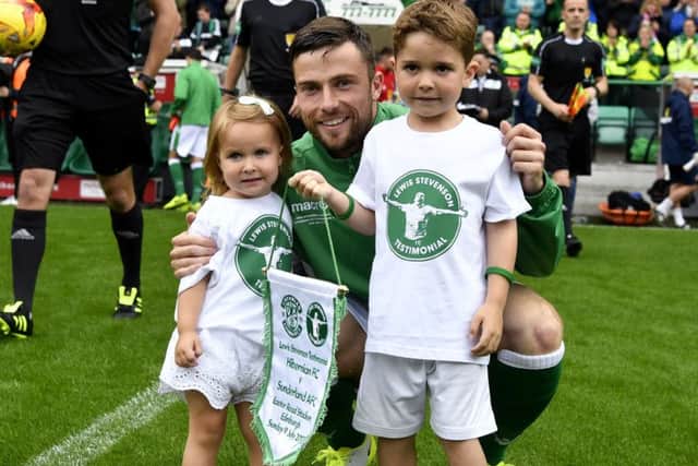 Lewis Stevensons children join him on the pitch before kick-off. Picture: SNS.