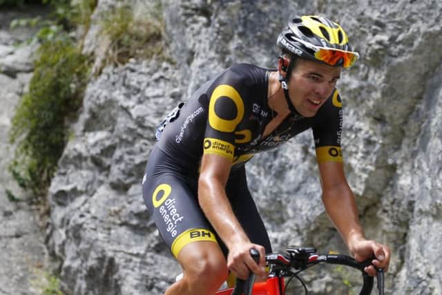 Stage winner and new best climber Frances Lilian Calmejane during the eighth stage to the Rousses ski station in the Jura Massif. Photograph: Peter Dejong/AP