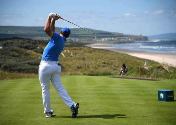 Jon Rahm of Spain tees off on the 1st hole on day three of the Dubai Duty Free Irish Open at Portstewart Golf Club. Picture: Ross Kinnaird/Getty Images