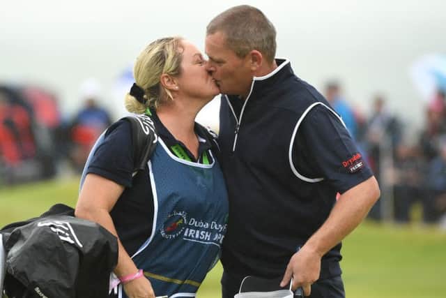 David Drysdale shares a kiss with wife/caddie Vicky after his closing 63 at Portstewart. Picture: Getty Images