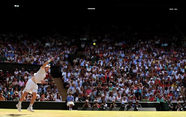 Andy Murray on his way to a three-set victory over Frenchman  Benoit Paire. Picture: PA.