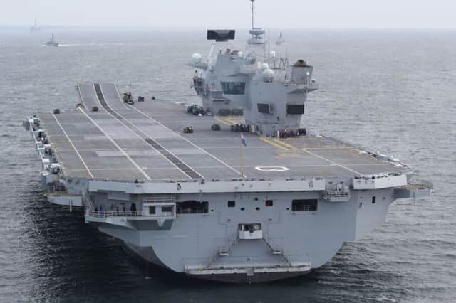 HMS Queen Elizabeth left Rosyth, where she has been under construction since 2014, on June 26 with 700 sailors and 200 industry contractors on board. Picture: Royal Navy/MoD/Crown Copyright/PA Wire