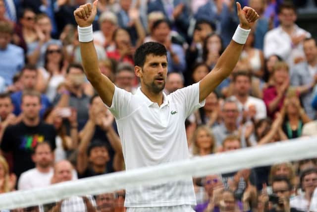 Thumbs-up from Novak Djokovic after his straight-sets defeat of Adrian Mannarino. Picture: PA.